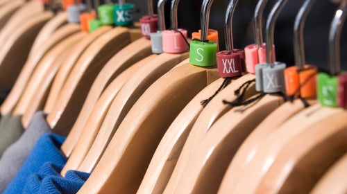 Clothing hangars with sizing tags