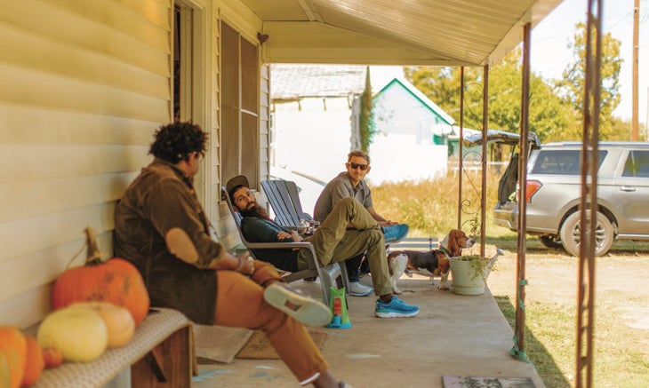 People on porch for film shoot