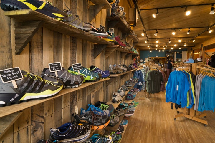 _Alpenglow_footwear wall Footwear wall and clothing racks in Alpenglow Sports