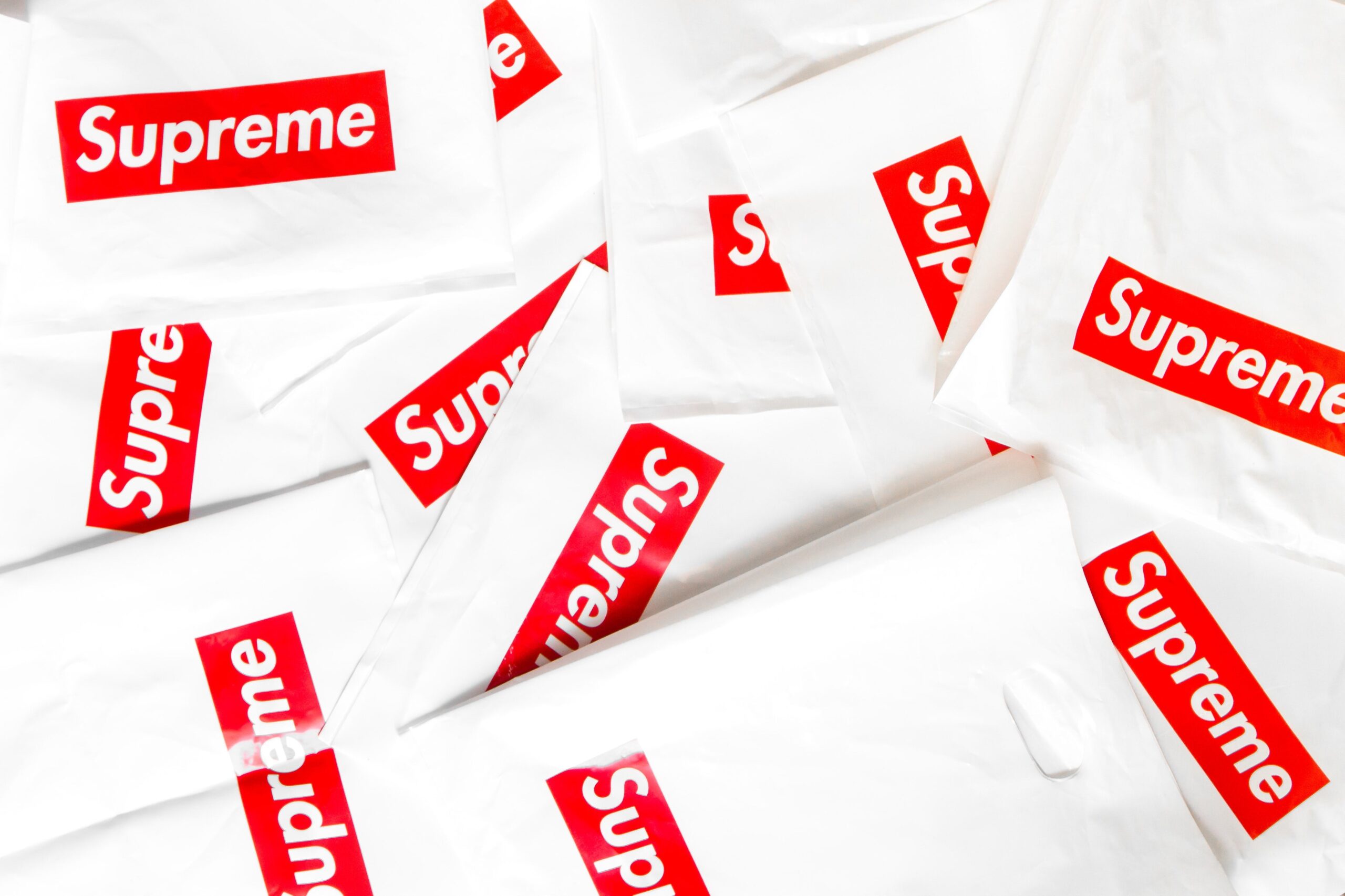 Download Supreme Logo - The Recognizable Brand for Streetwear Wallpaper