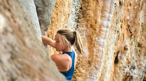 Woman rock climbing