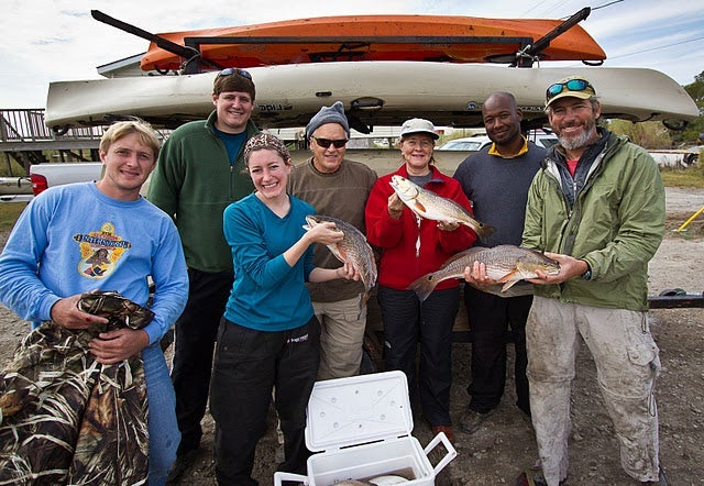 fishing_group John Williams, right, poses with a successful P&P guided kayak fishing group