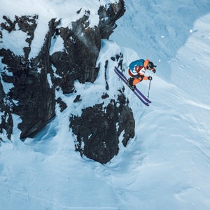 A skier mid-jump on the Freeride World Tour