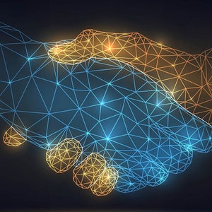 Digital blue and yellow hands shaking