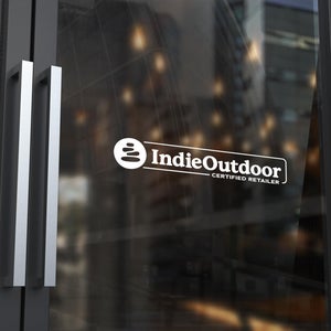 a glass door with a sticker that says 