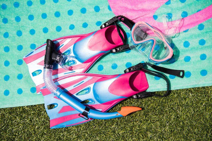 leader Montego Bay Snorkel Kit JR Leader mask, fins, and snorkle on beach towel