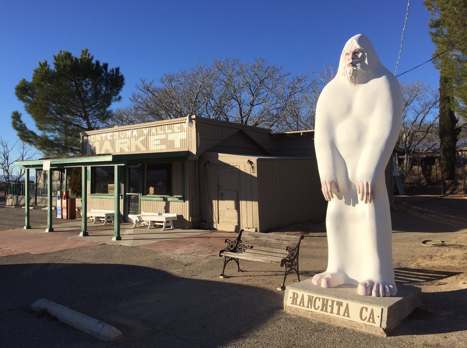 Large statue of white Yeti in front of a shop called Montezuma Valley Market, which recently suffered a fire