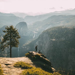 Two figures in the middle of the wilderness