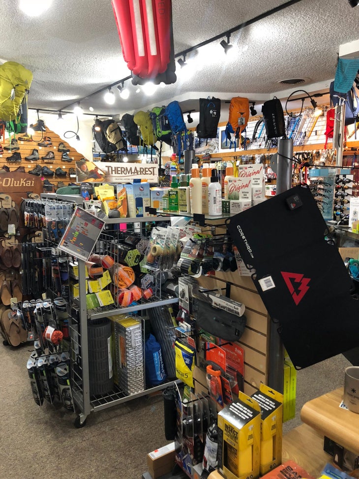 Gear hangs from the ceiling at Nomad Ventures' Escondido location