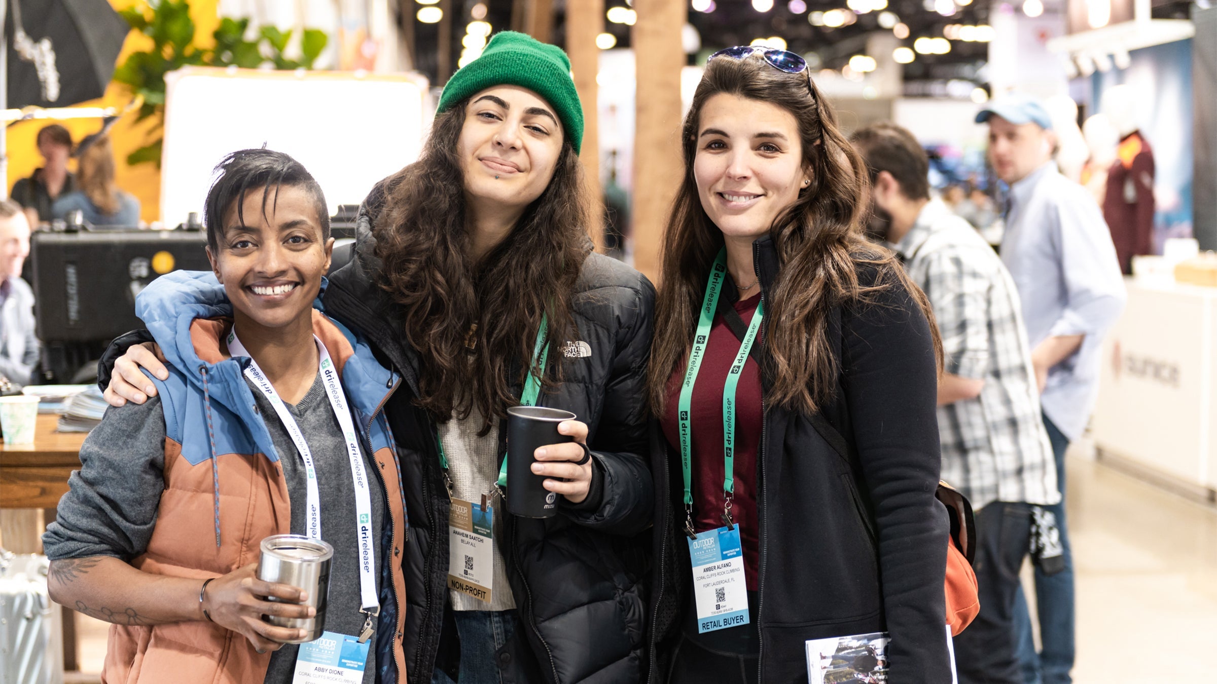 Three women at Outdoor Retailer