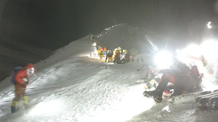 Everest climbers head out in the dark. 