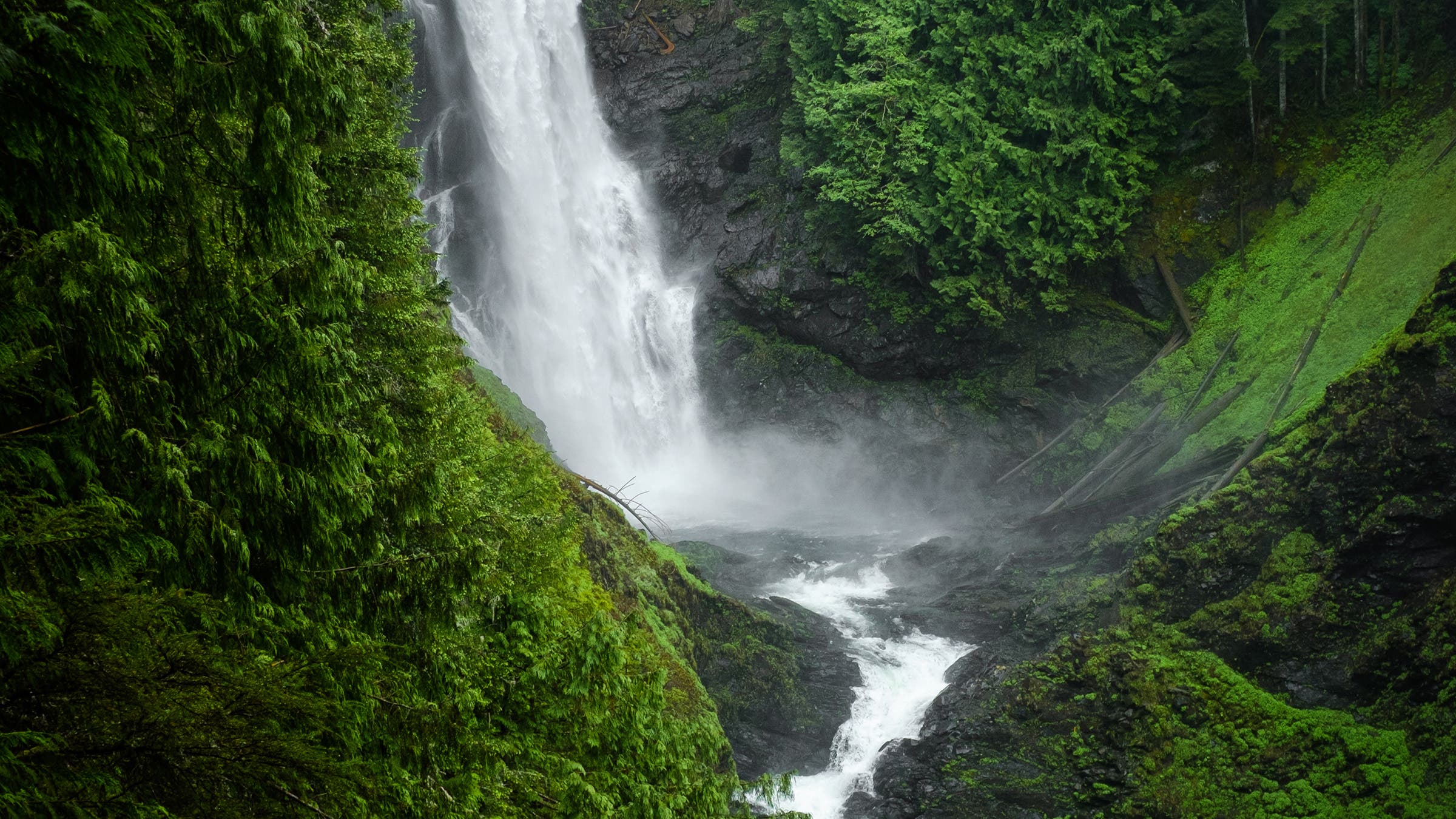 The Wallace River cascades over a cliff as Wallace Falls in Wallace Falls State Park