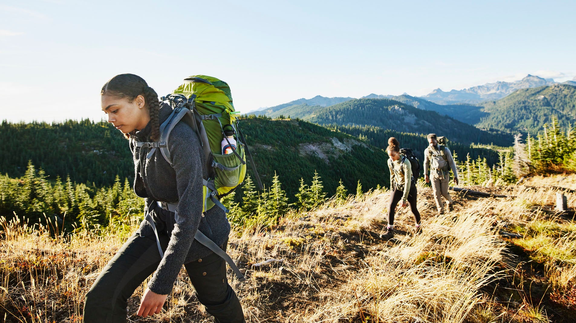 Woman hiking with her family.
