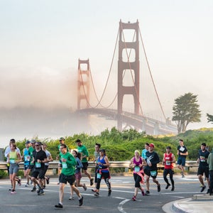 San Francisco Marathon participants run past the Golden Gate Bridge