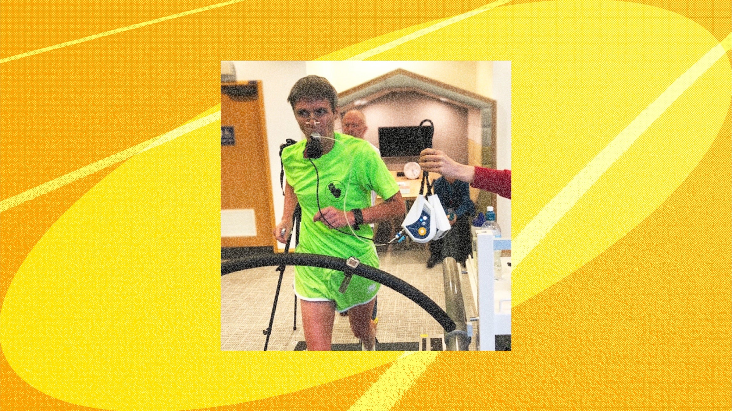 a man dressed in green on a treadmill