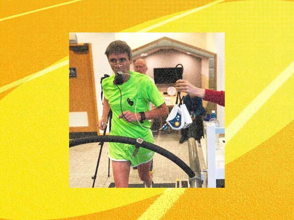 a man dressed in green on a treadmill