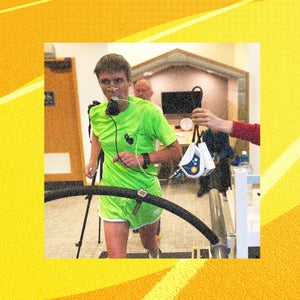 a man dressed in green on a treadmill