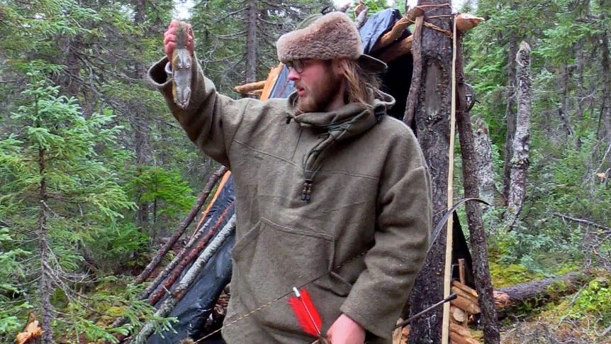 Jacques Turcotte catches a squirrel.