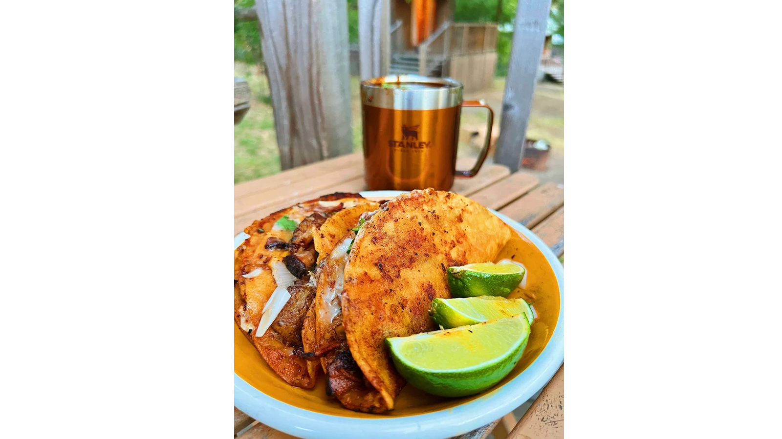 A plate of gourmet campground tacos—fresh limes add flavor.