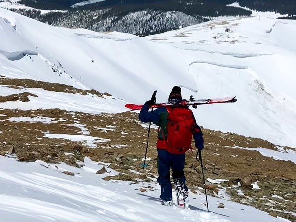 Liam Doran hikes down Bald Mountain's north ridge after escaping the avalanche.