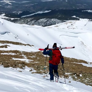 Liam Doran hikes down Bald Mountain's north ridge after escaping the avalanche.