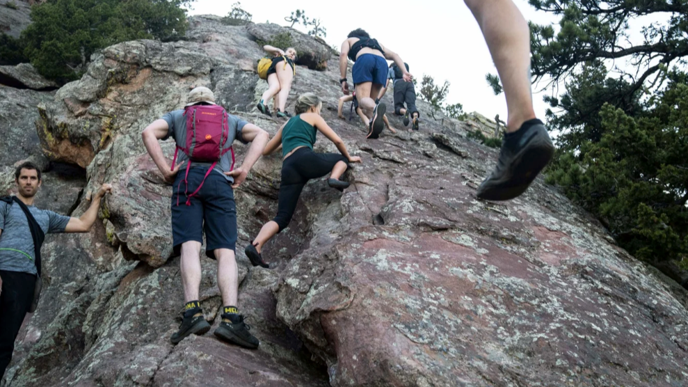 Solo climbers on the Second Flatiron, Boulder, Colorado.