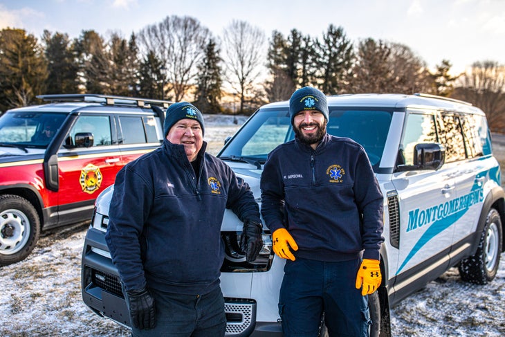 Montgomery EMS posing with Land Rover Defender