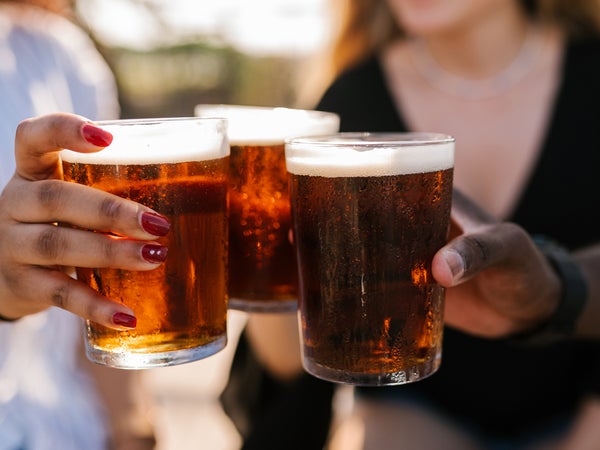 Friends toasting with beer