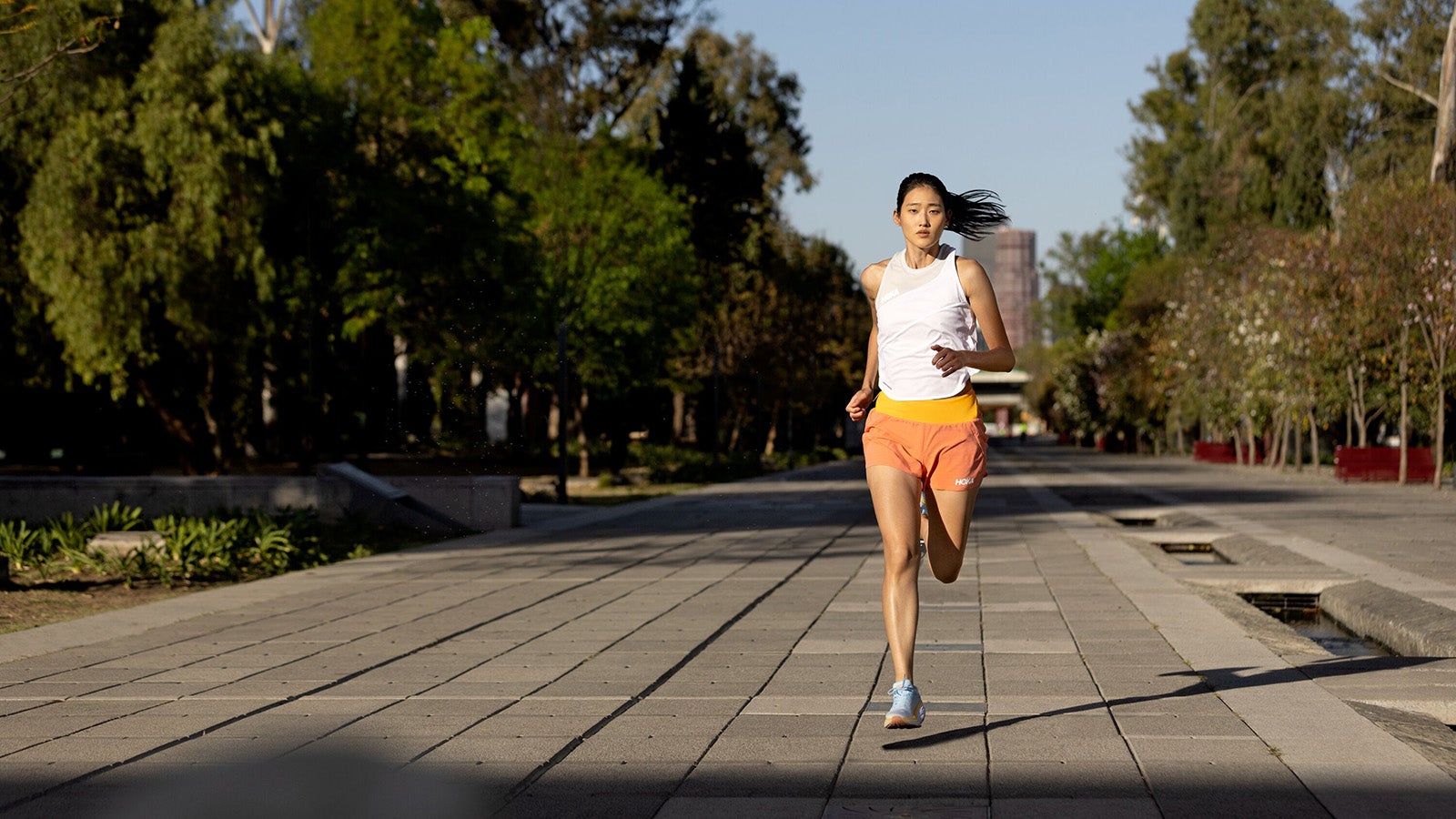 Beautiful women working out in a city. Running, jogging, exercise, people,  sport concept