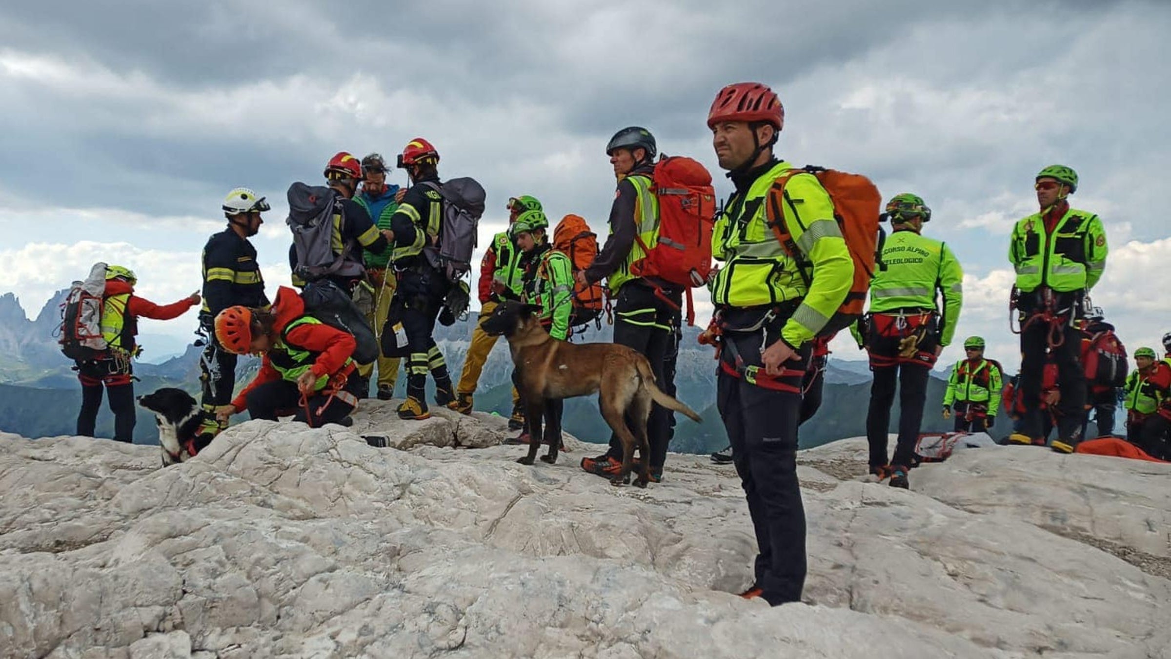A rescue team prepares to evacuate climbers on the Marmolada.
