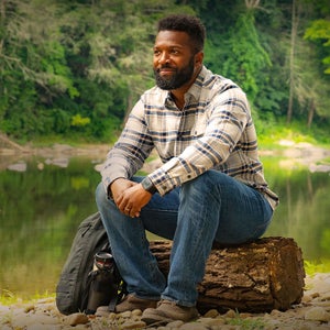 Man sitting on a log