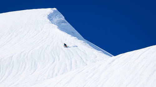 A skier on a big mountain