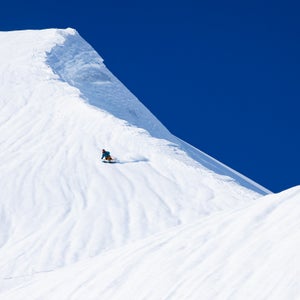 A skier on a big mountain