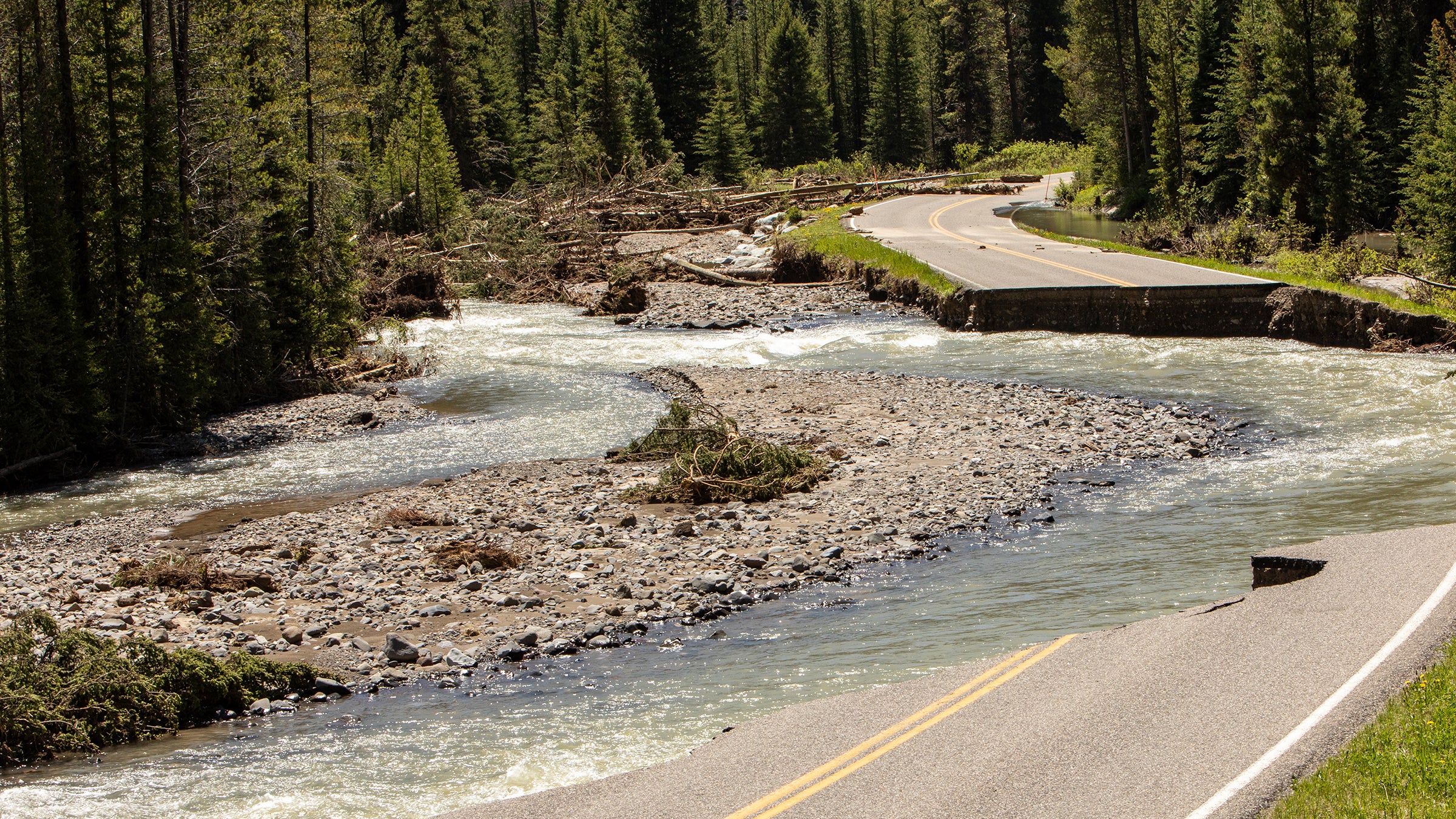 Flood damage to the Northeast Entrance Road near Silver Gate, Montana.