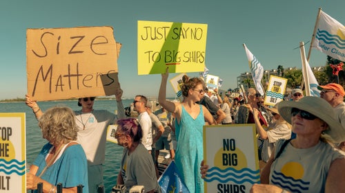 Locals protest as a ship arrives in Key West.