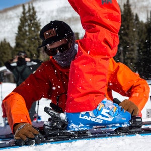 Ski tech adjusting binding to ski boot