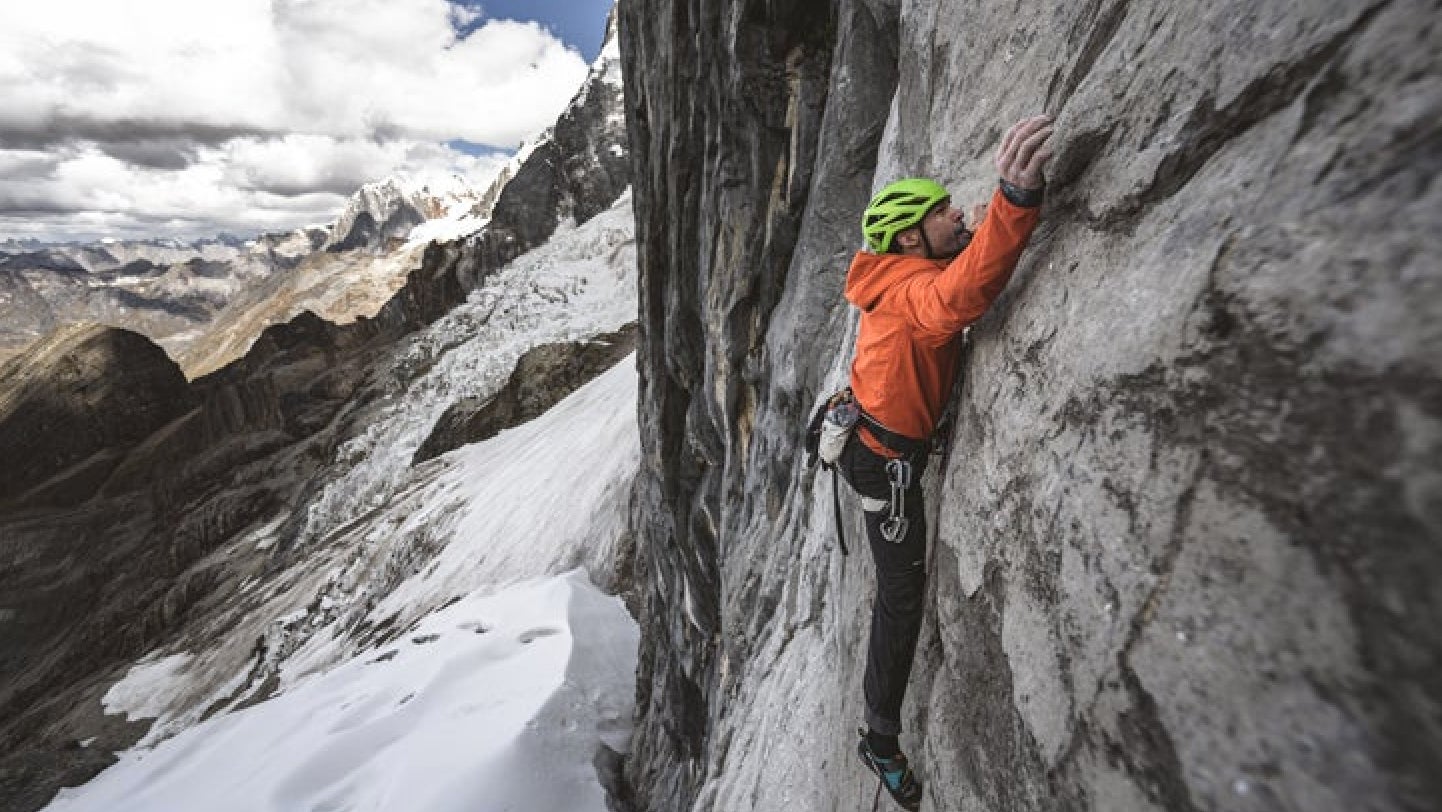 Ascending a steep rock wall.