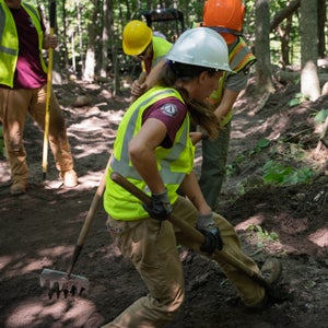 Trail workers performing maintenance on public trails