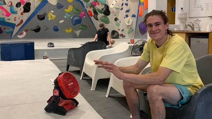 climber in gym with fan