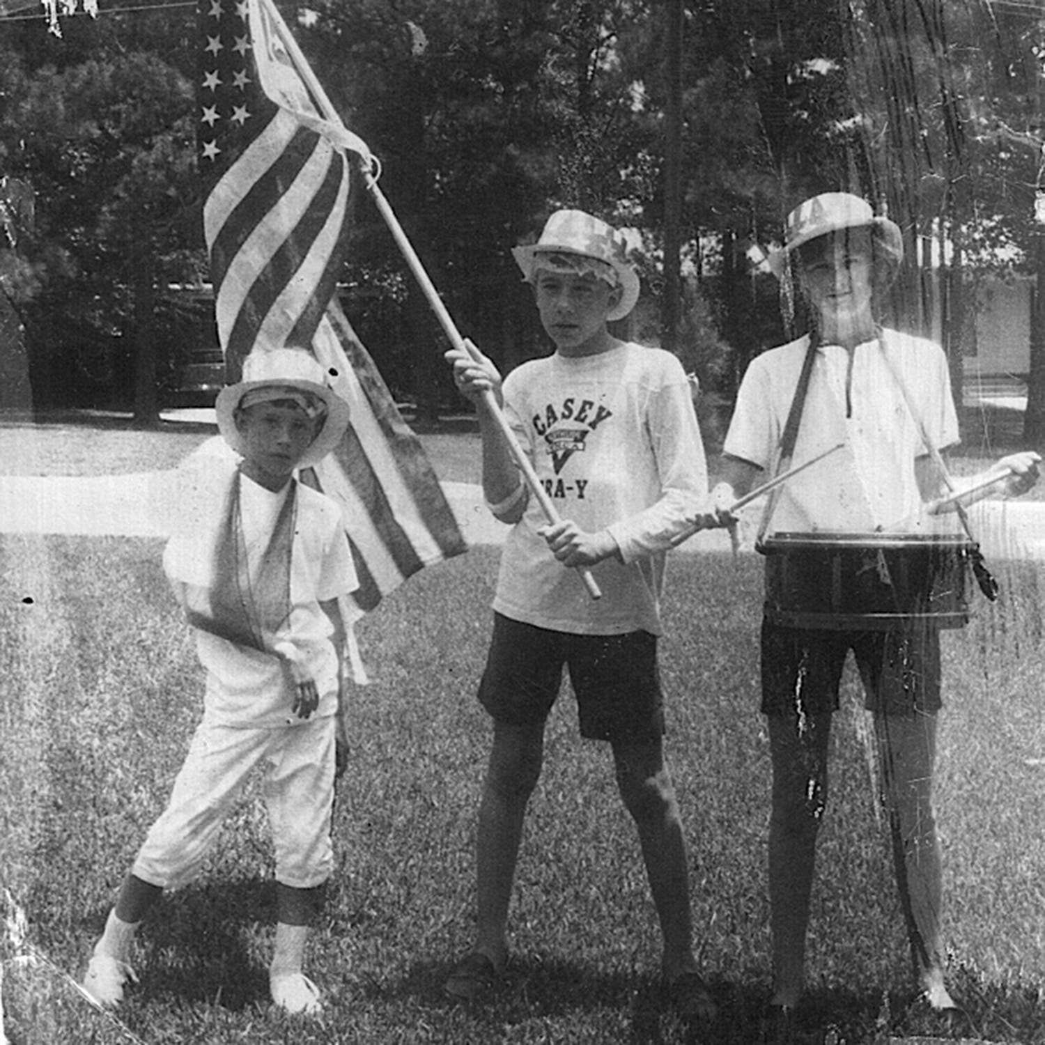 The author, left, celebrating the Fourth of July with his brother and sister