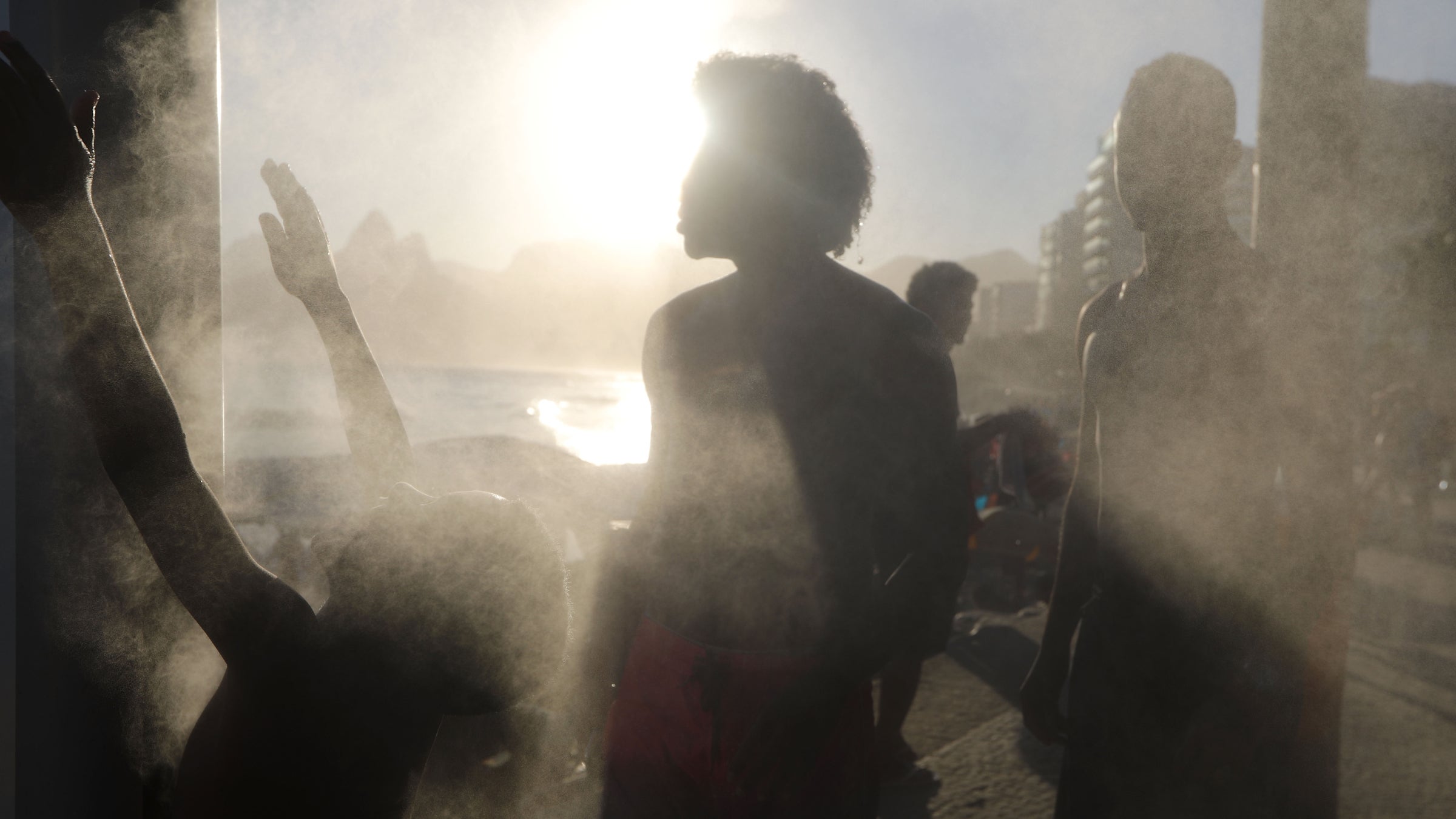 People cooling off during a heat wave in Rio de Janeiro