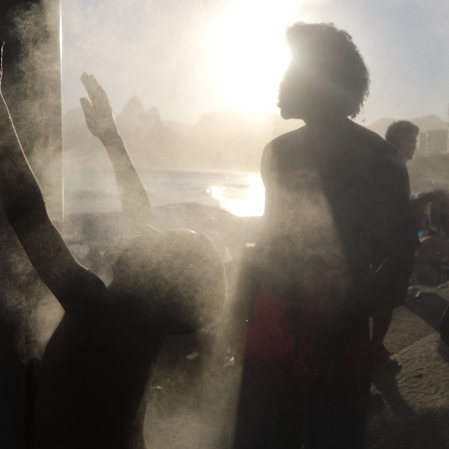 People cooling off during a heat wave in Rio de Janeiro