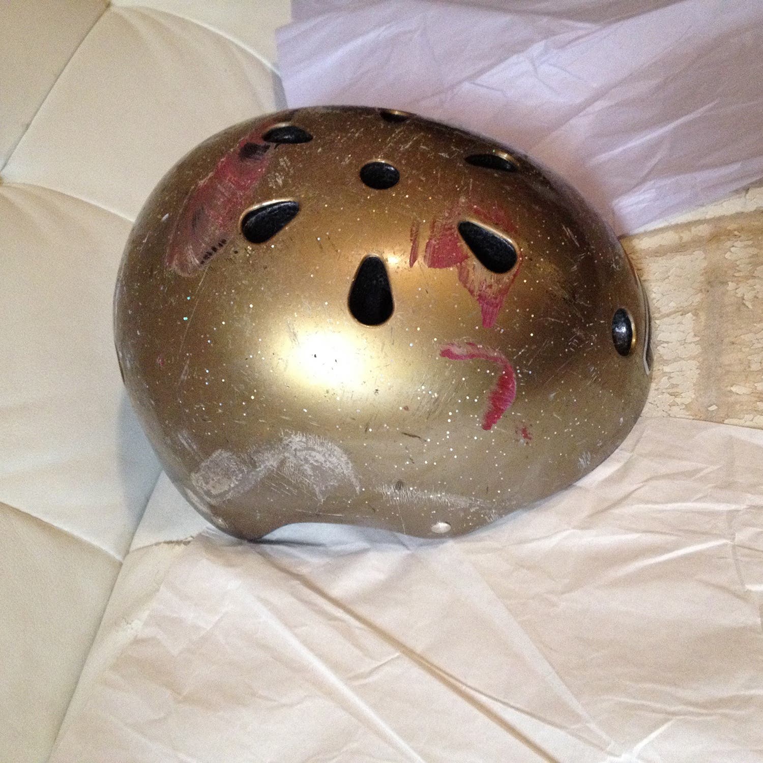 The helmet Lauren was wearing when she was hit, streaked with red paint from the car
