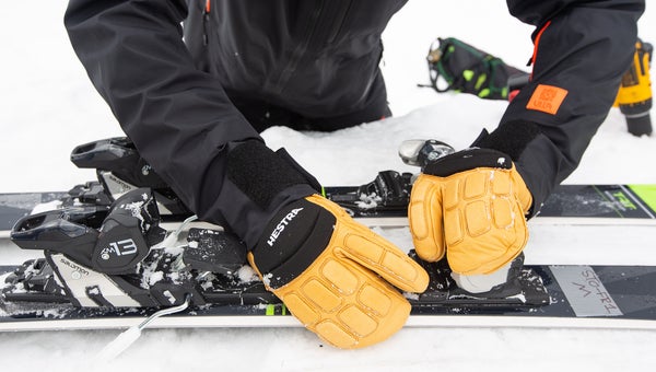 Ski tech adjusting ski binding