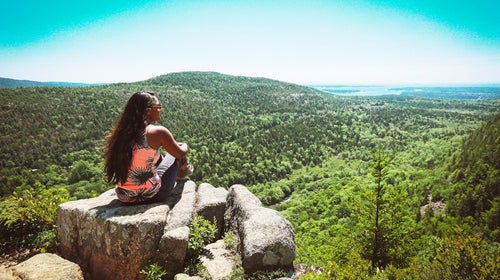 woman looking over landscape