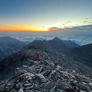 A hiker on a tall Colorado mountain