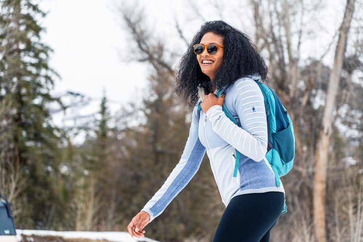women hiking in smartwool layers