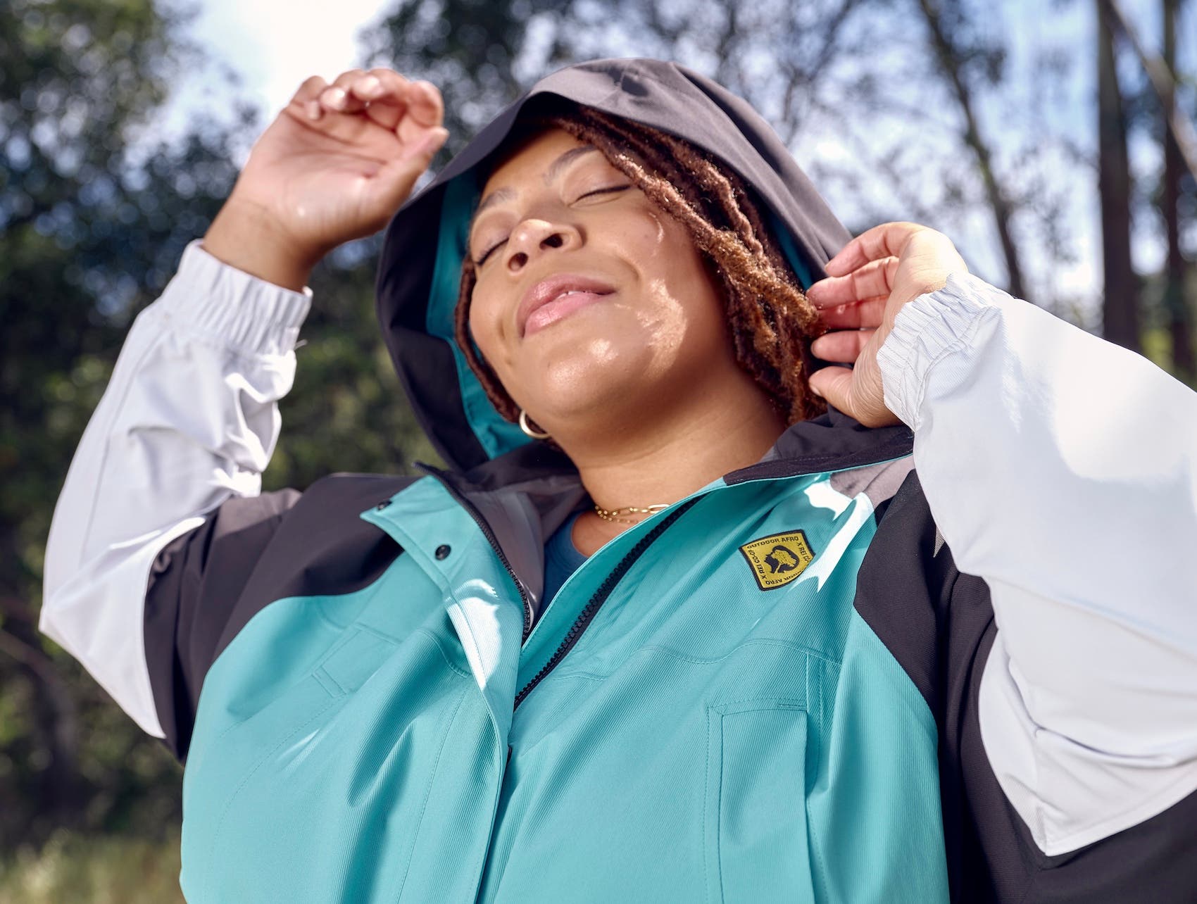 Woman wearing a blue rain jacket
