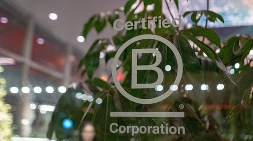 B Corp logo on glass window