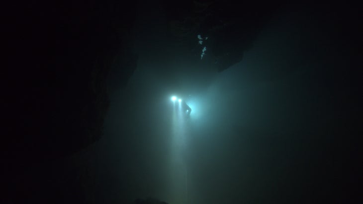 A diver in a cave